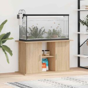 Aquarium with water and fish on a wooden stand in a contemporary living space.